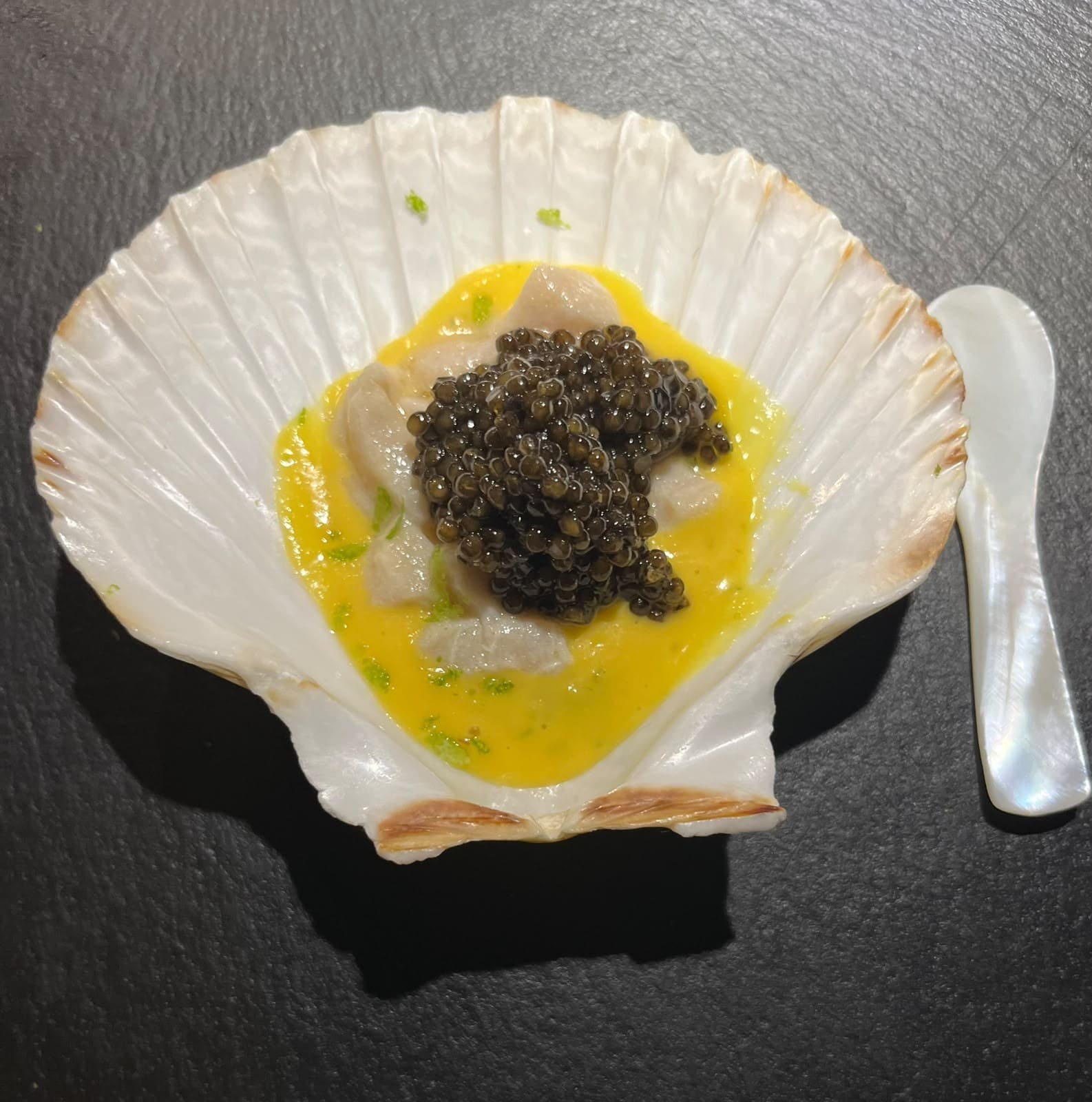Sturgeon ceviche with peach and caviar